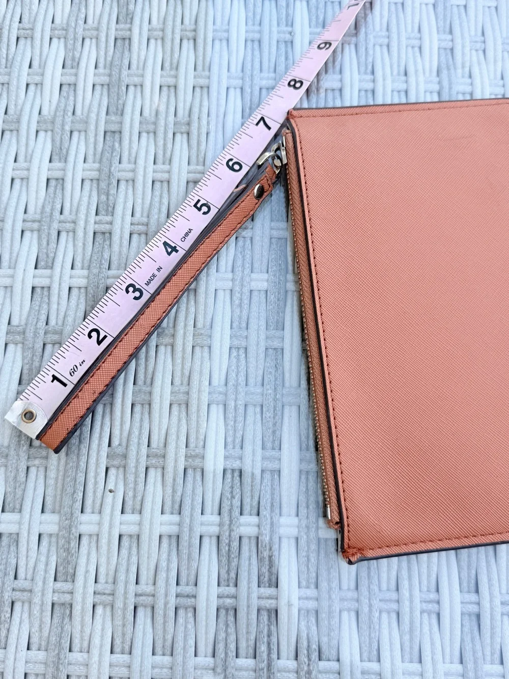kate spade wristlet clutch in rust orange